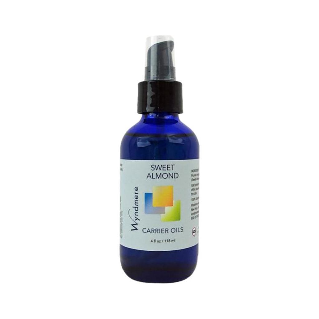 4oz cobalt blue bottle of Wyndmere Sweet Almond Oil with treatment pump