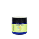A 1oz cobalt blue jar of Wyndmere Vibrant Skin cream
