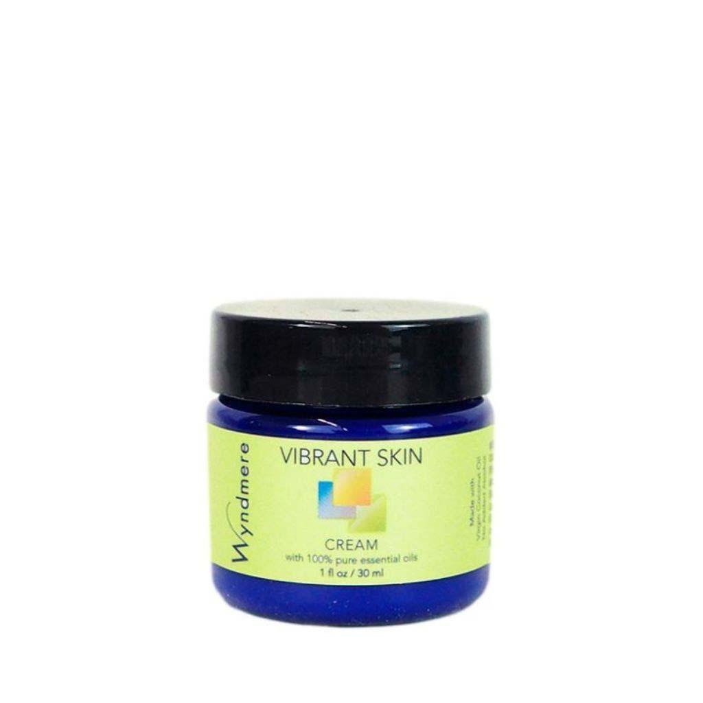 A 1oz cobalt blue jar of exquisitely smelling Wyndmere Vibrant Skin cream that helps mitigate the effect of time