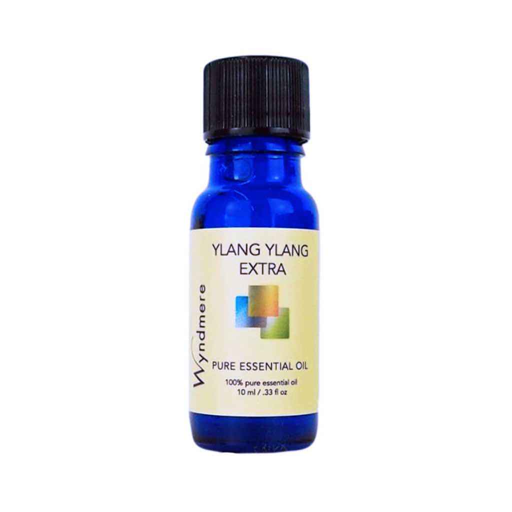 Ylang Ylang Extra - Blue bottle of Wyndmere Ylang Ylang Extra Essential Oil that has a sweet, floral aroma used in perfumes